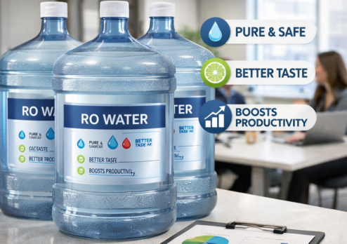 Office setting with multiple RO water gallon bottles labeled “pure & safe,” “better taste,” and “boosts productivity,” highlighting why workplaces prefer RO water for clean, great-tasting hydration and improved employee performance.