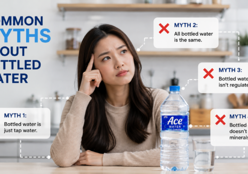 A woman looks at a bottled water infographic that debunks common myths about bottled water, highlighting facts about water quality, minerals, and safety.