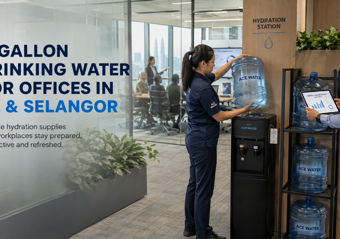 Ace Water staff setting up a 5-gallon drinking water bottle and water dispenser at a modern office in Kuala Lumpur, highlighting reliable workplace drinking water supply for offices in KL and Selangor.