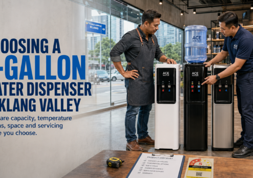 A customer compares different 5-gallon water dispensers with assistance from an Ace Water representative in Klang Valley, highlighting important factors such as capacity, temperature options, space, energy efficiency, and servicing support.